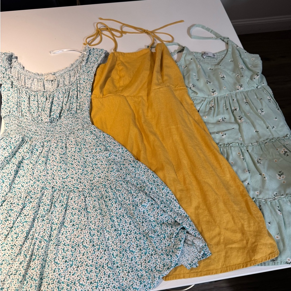 Hollister ,‎ Aeropostale, Old Navy dresses.   All three for one price.  XS